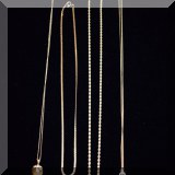 J03. Gold necklaces. 